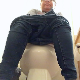 A plump, dark-skinned girl sits on a toilet, farts gently, pisses, and takes a shit with a few clearly-heard plops. Field of view focuses on her feet and lower legs. She wipes when finished. No product shown. Presented in 720P HD. Over 3 minutes.